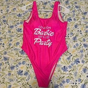 Come on Barbie let’s go party women’s pink one piece swimsuit